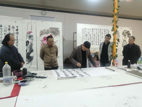 花红柳绿翰墨香,书法艺术名家张利张禹父子做客鹏举书画院